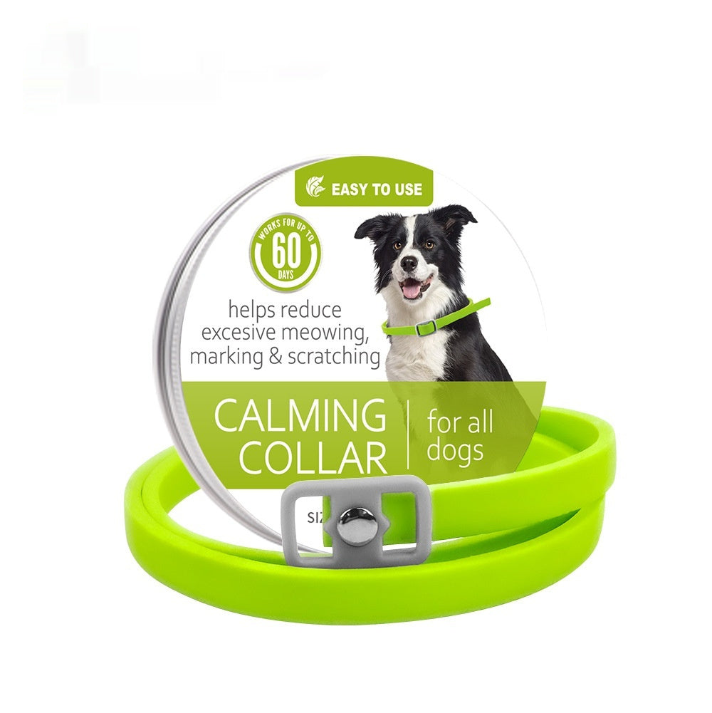 Green calming collar with buckle, dog shown on packaging card