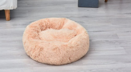 Light peach round plush pet bed with thick curled cushion