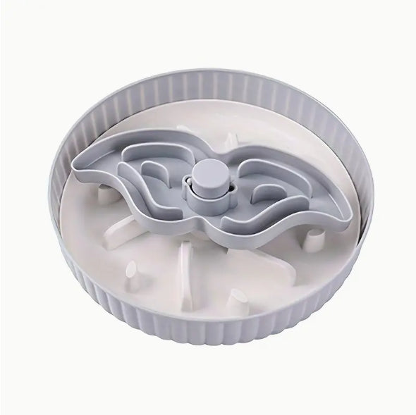 Light gray rotating slow-feeding board with central spinner and channels