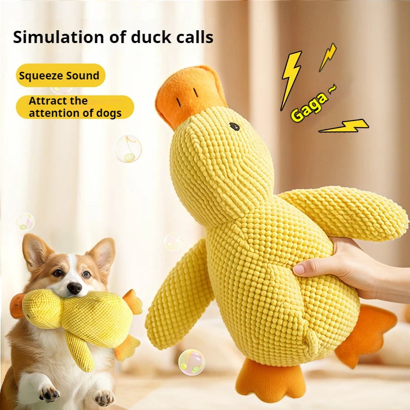 Yellow plush duck squeaky chew toy with orange wings and stitched beak