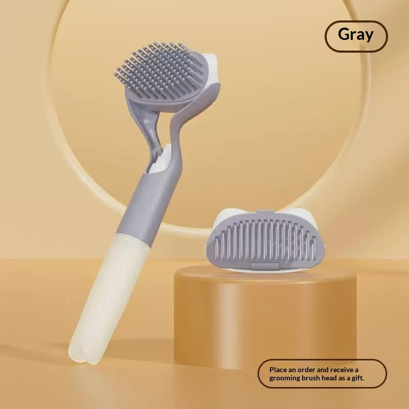 Gray 3-in-1 pet grooming brush with gray bristle head and long handle